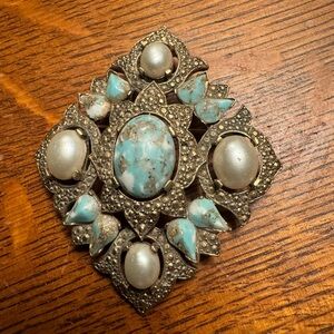 My grandmothers brooch. 50 plus years old.